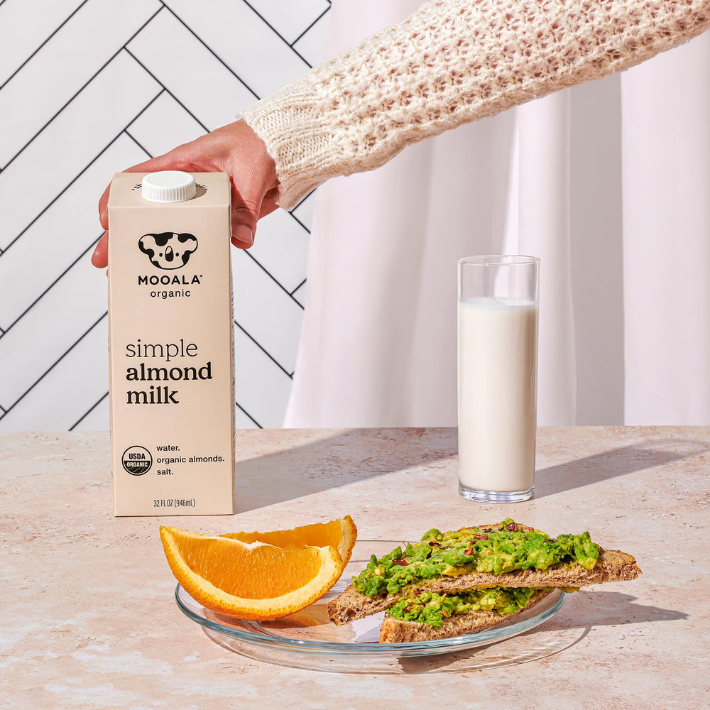 Mooala Almond Milk smoothie being blended for a nutritious drink.