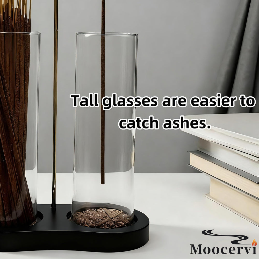 Moocervi vertical arrangement of incense inside the glass tube.
