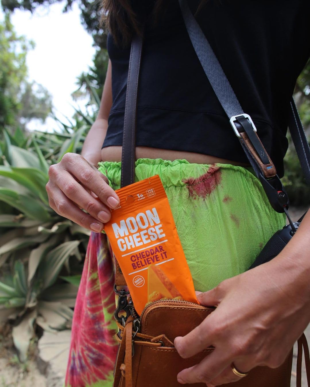Moon Cheese Cheddar Believe It road trip snack with bold cheddar flavor