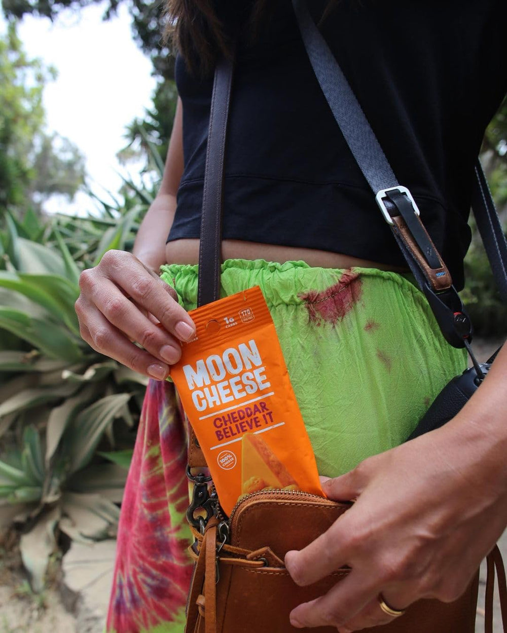 Moon Cheese Cheddar Believe It road trip snack with bold cheddar flavor