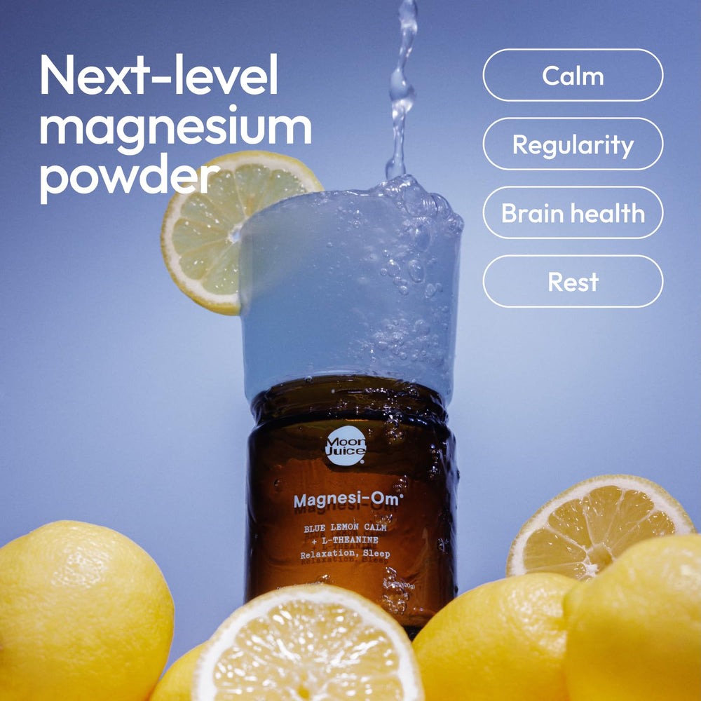 Moon Juice Magnesi-Om powder scoop ready to mix for calm evenings.