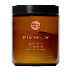 Moon Juice Magnesi-Om bottle label closeup highlighting chelated magnesium for calm.
