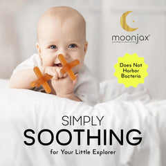 Moonjax teether held by tiny hands during play, showing ergonomic design.