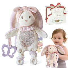 Moonkie baby lovey with silicone teether calms little gums during on-the-go soothing.