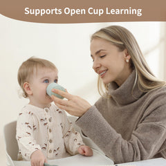 Moonkie Open cup for independent drinking aids early oral coordination.