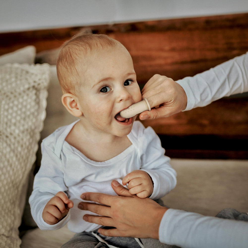 Moonkie silicone bristles provide gentle yet effective cleaning.