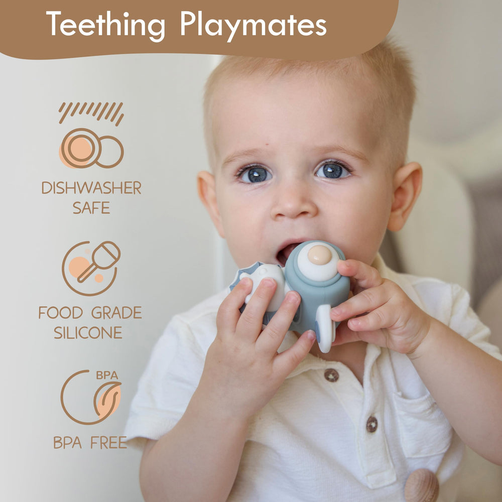 Moonkie soft-silicone rings provide easy grasping for teething and early hand coordination.