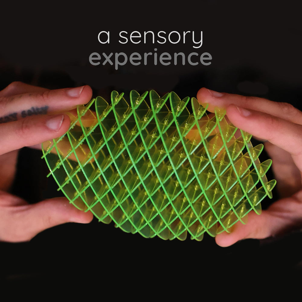 Morf Fidget Worm stretched for stress relief and quiet, portable play.