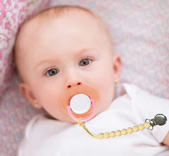 MORIBOX pacifier clip shown in elegant gift box for baby gifting.