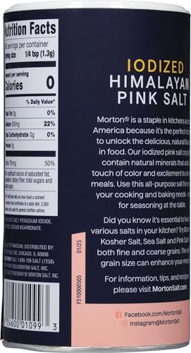 Morton iodized Himalayan pink salt shaker on counter for quick seasoning.