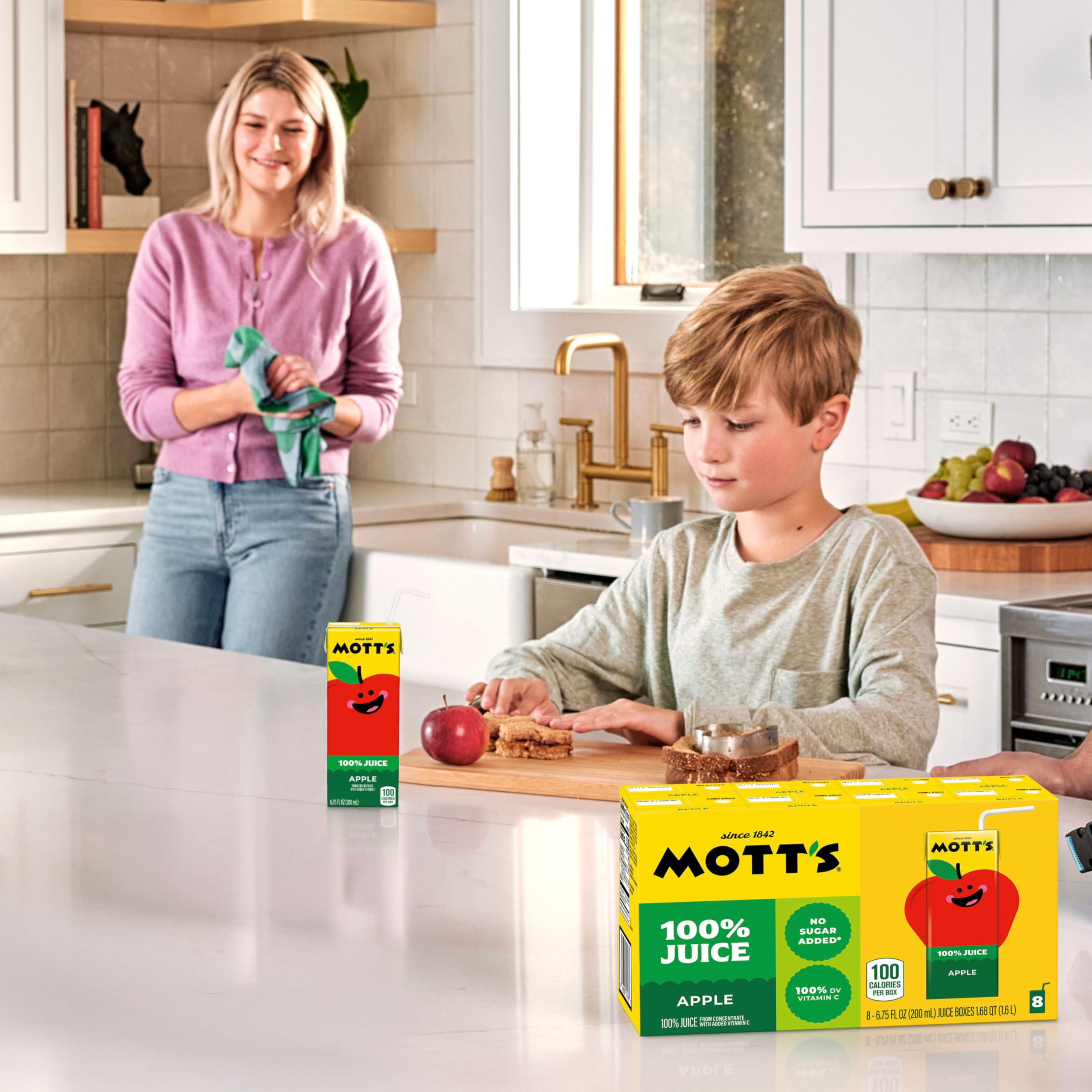 Family enjoying Mott's Apple Juice during mealtime