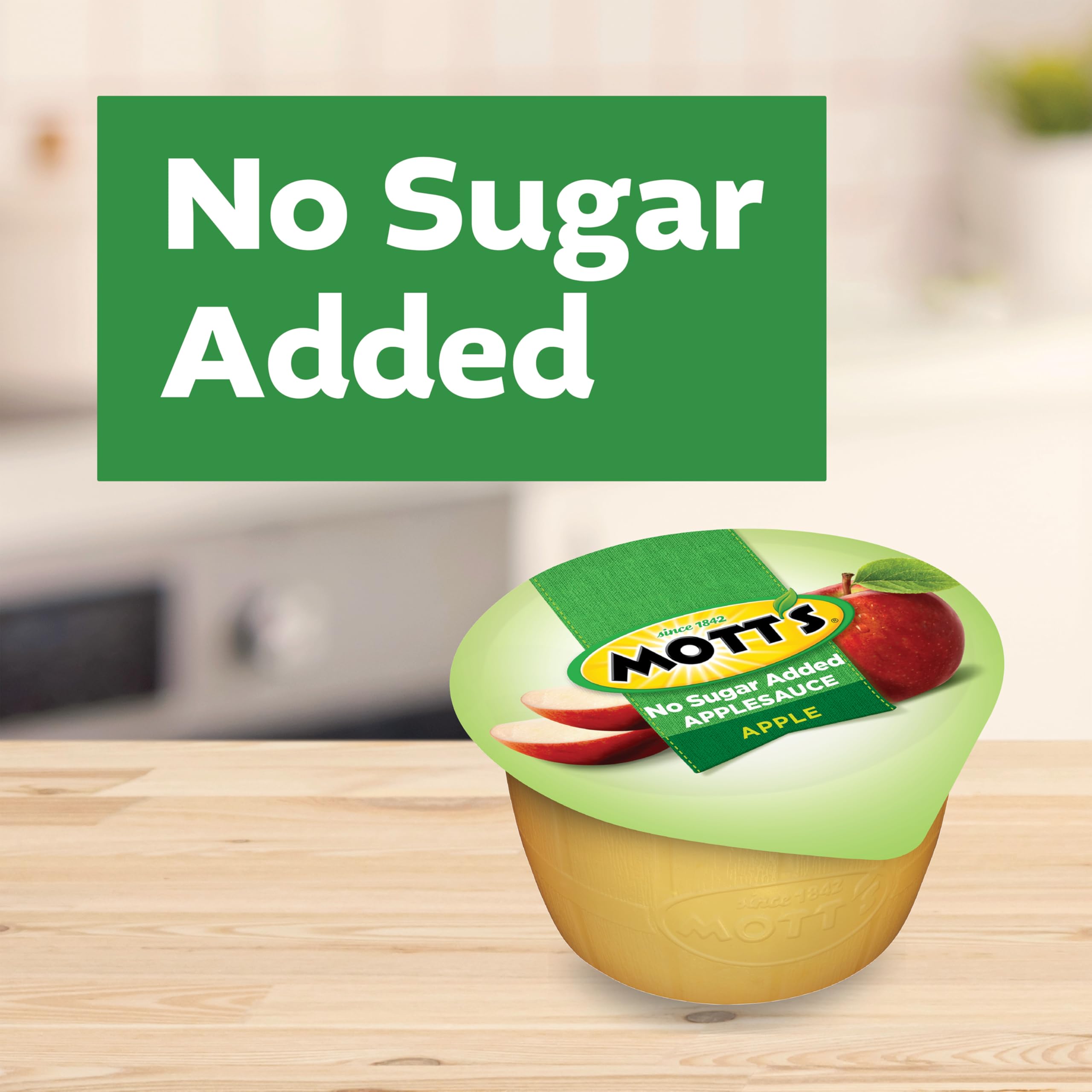 Unsweetened Mott's applesauce in a clear cup, ideal for versatile meals.