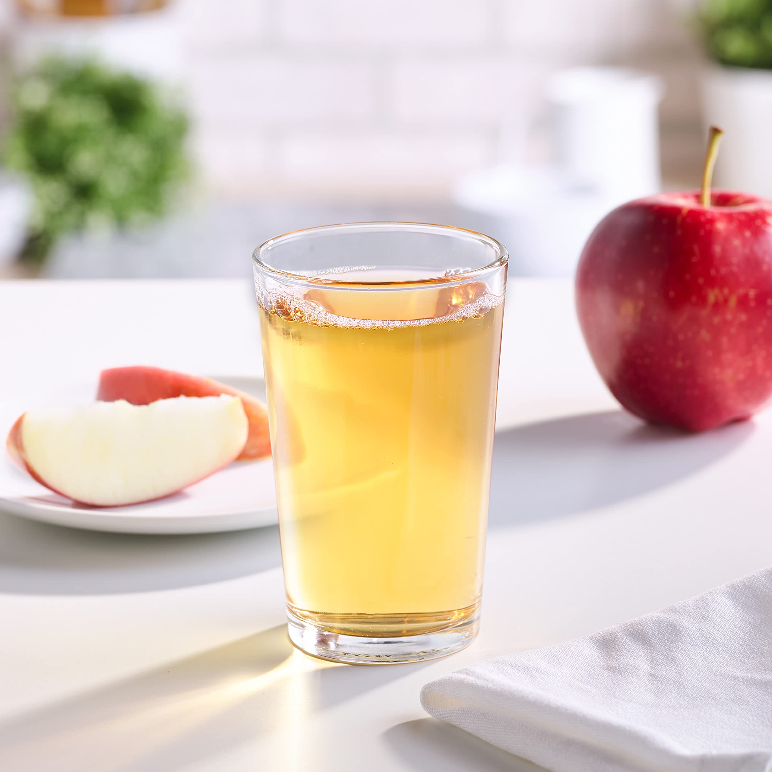 Mott's For Tots Apple juice nutrition panel highlights Vitamin C per serving.
