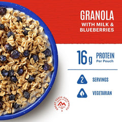 Mountain House Granola with Milk & Blueberries being prepared with hot water for quick setup.