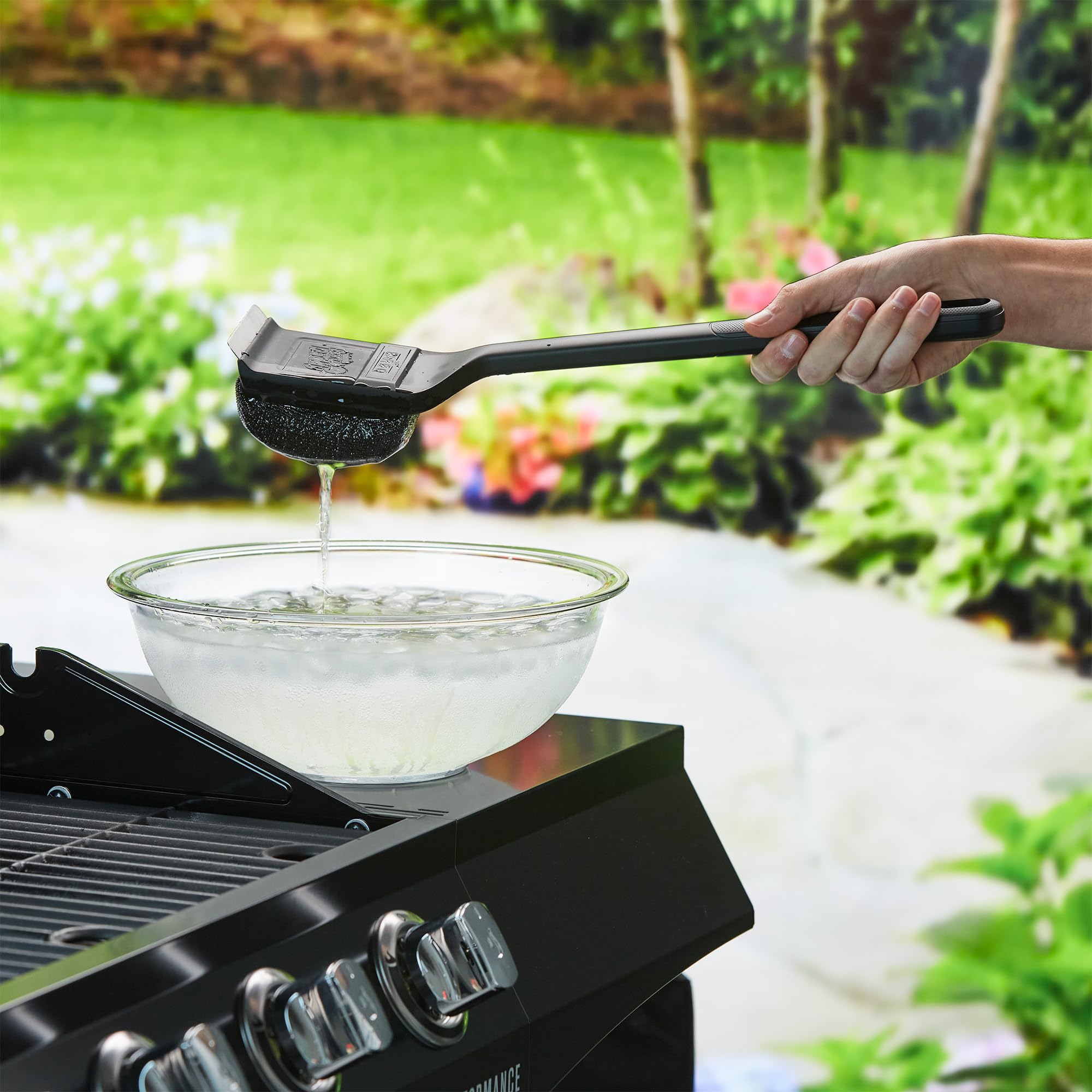 Heavy-duty scraper providing extra leverage for tough buildup on Mr. Bar-B-Q tool
