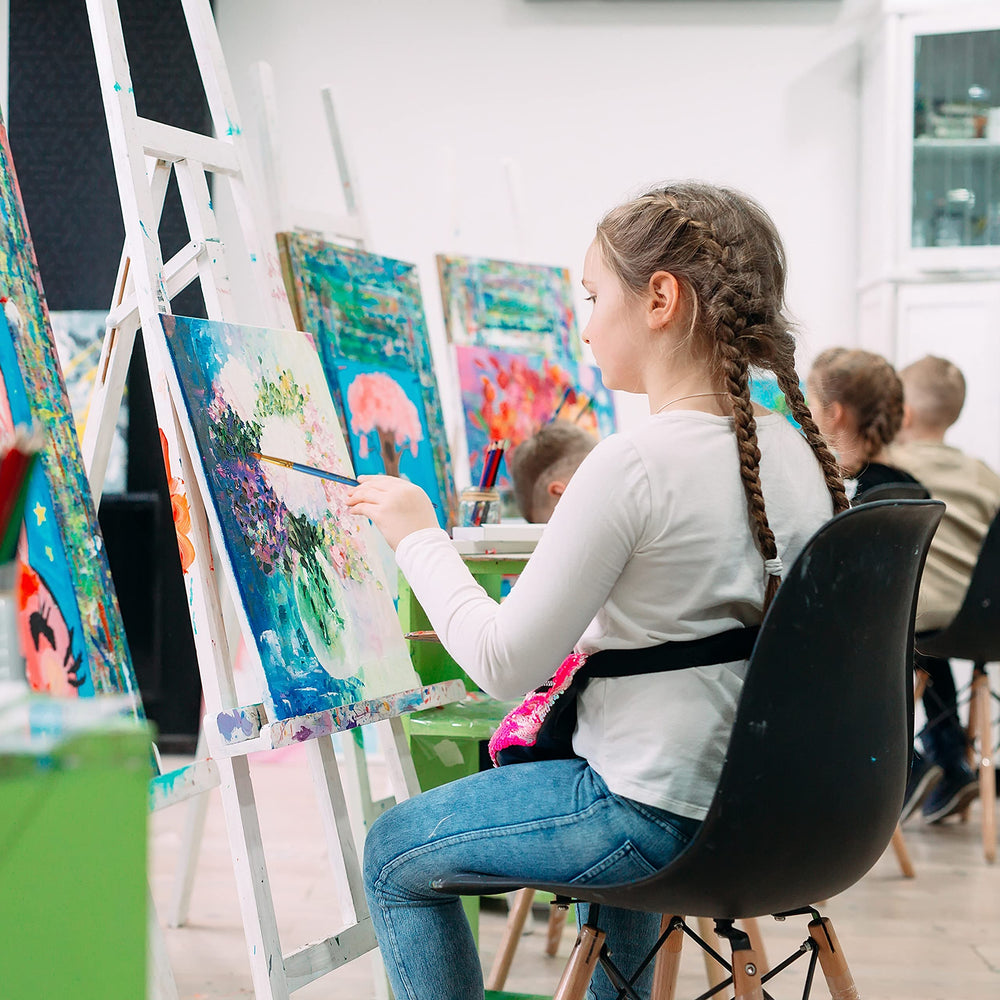 Kids and adults explore watercolor painting with washable pigments and easy cleanup