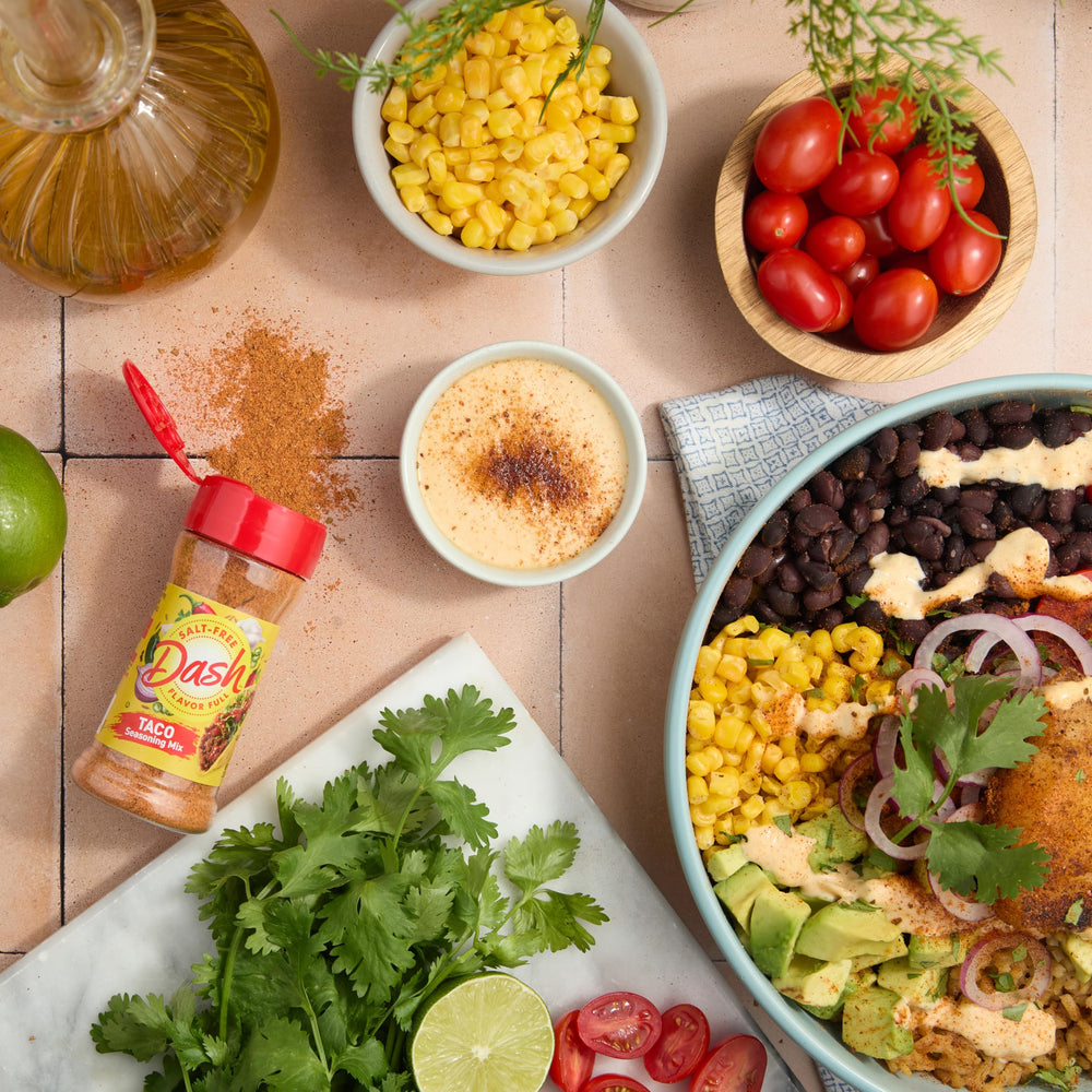 Kitchen scene shows quick weeknight dinner with easier seasoning from Mrs. Dash.