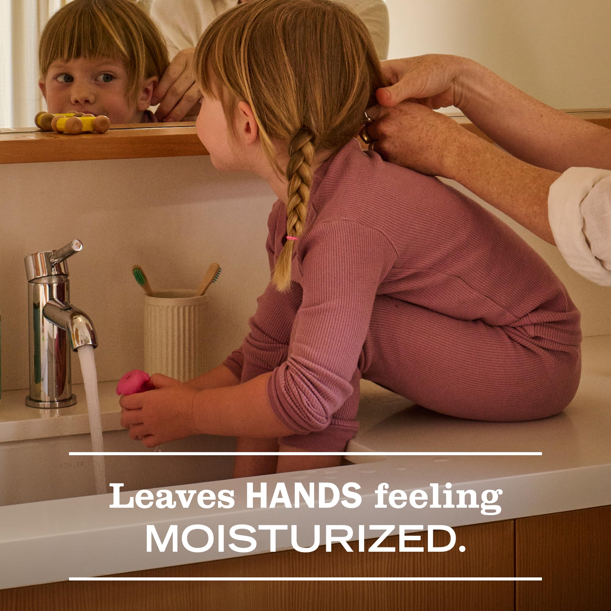 Aloe vera and olive oil icons signal moisturizing formula.