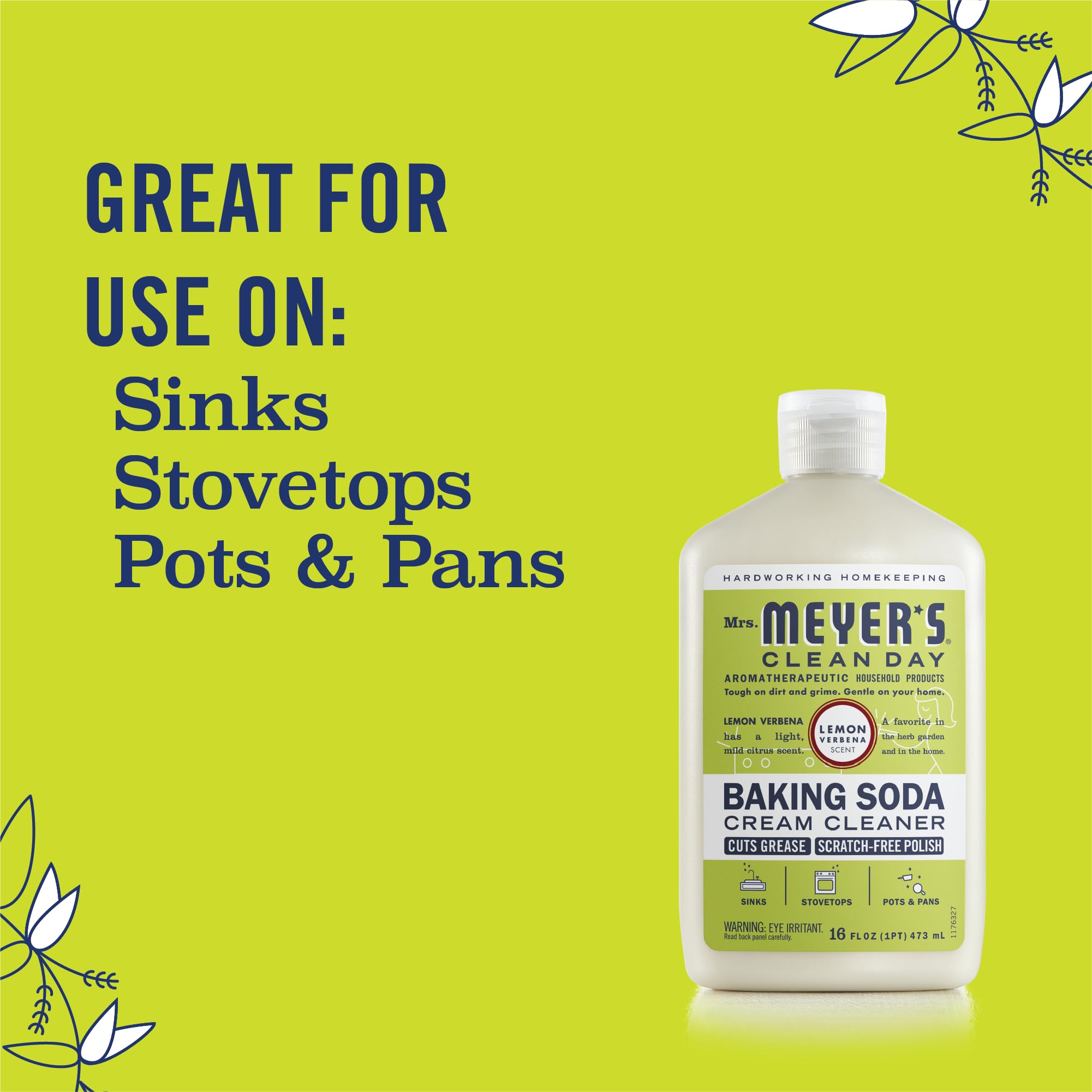 Mrs. Meyer's Clean Day bottle beside pans ready for kitchen polishing.