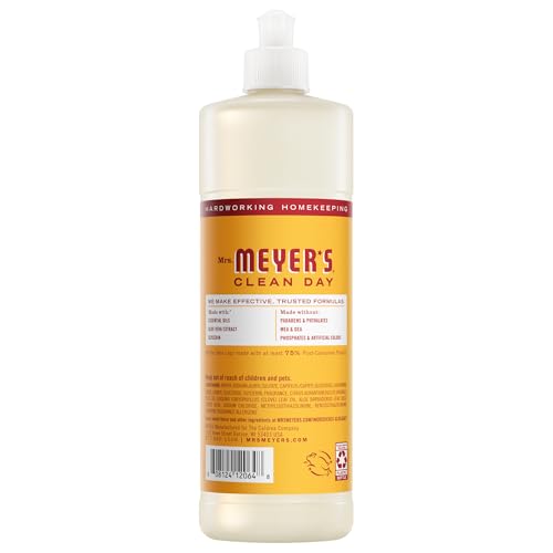 Clementine dish soap poured for quick hand washing from Mrs. Meyer's bottle.