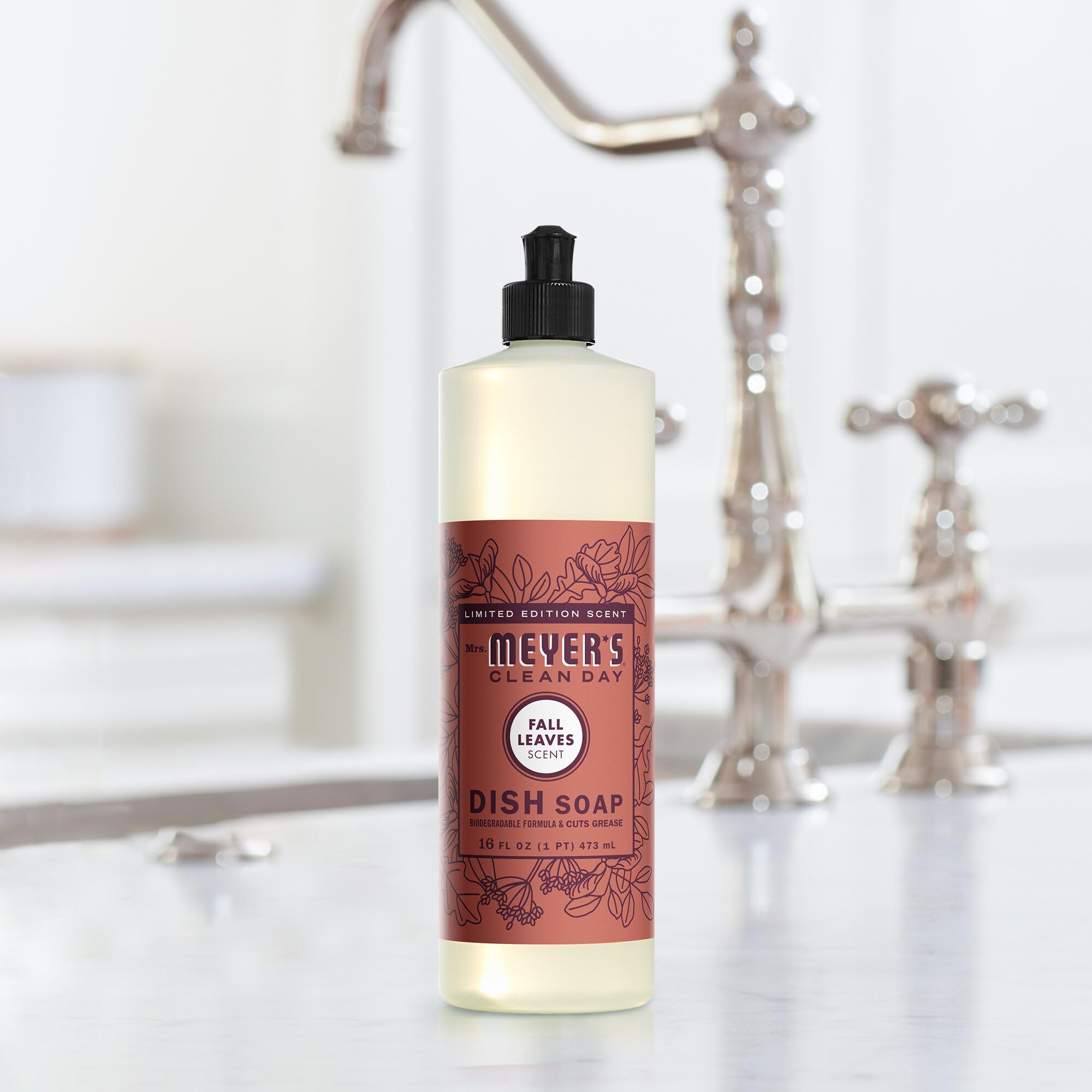 Close-up of leaves motif and bottle from Fall Leaves scent.