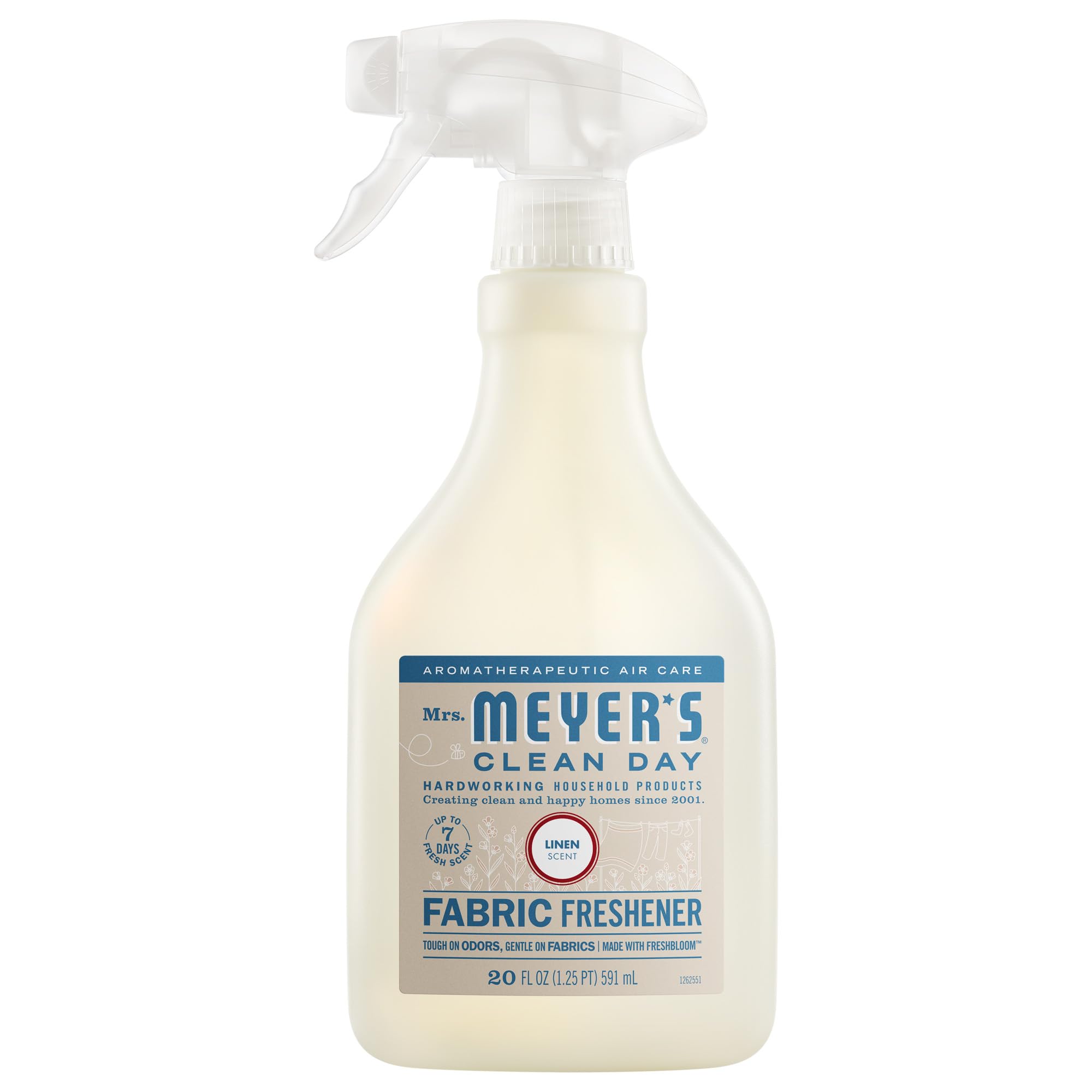 Mrs. Meyer's Clean Day Fabric Freshener bottle with linen scent refreshes fabrics.