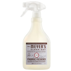 Mrs. Meyer’s Clean Day Lavender fabric freshener bottle refreshes fabrics with garden-inspired scent.