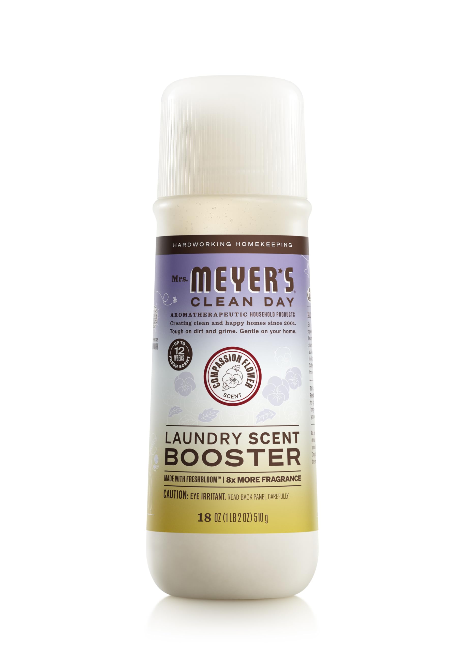 Mrs. Meyer's Laundry Scent Booster bottle with Compassion Flower delivers a garden-inspired fragrance.