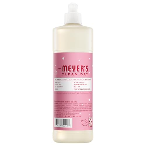Pouring Mrs. Meyer's Clean Day Peppermint Dish Soap to tackle tough residue.