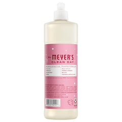 Pouring Mrs. Meyer's Clean Day Peppermint Dish Soap to tackle tough residue.