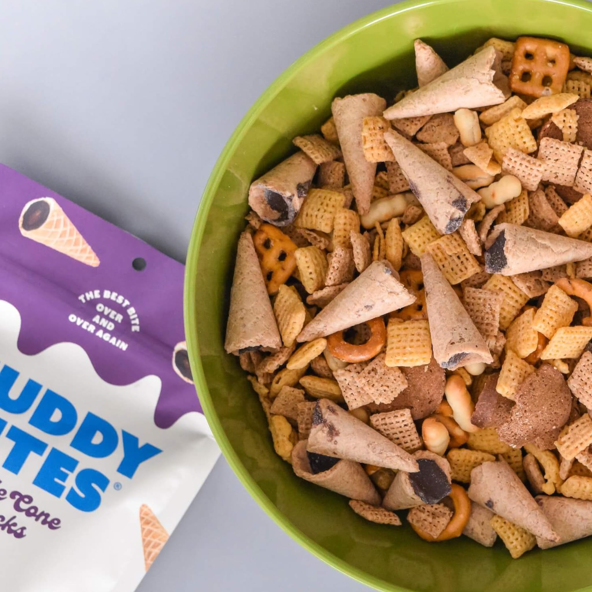 Muddy Bites fair trade kosher certifications badge visible on packaging.