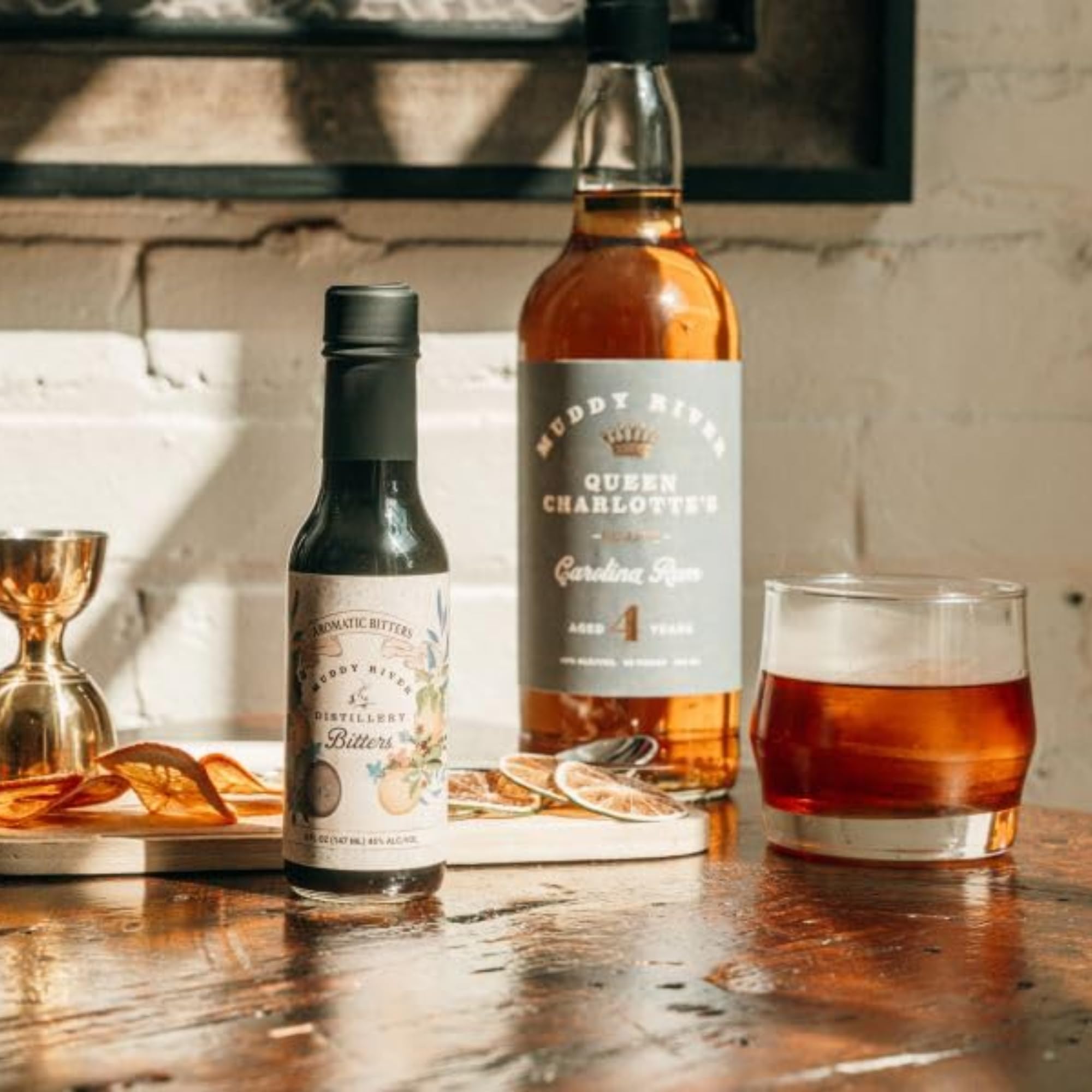Muddy River Distillery Aromatic Bitters old-fashioned glass demonstrates smooth, balanced whiskey cocktails.