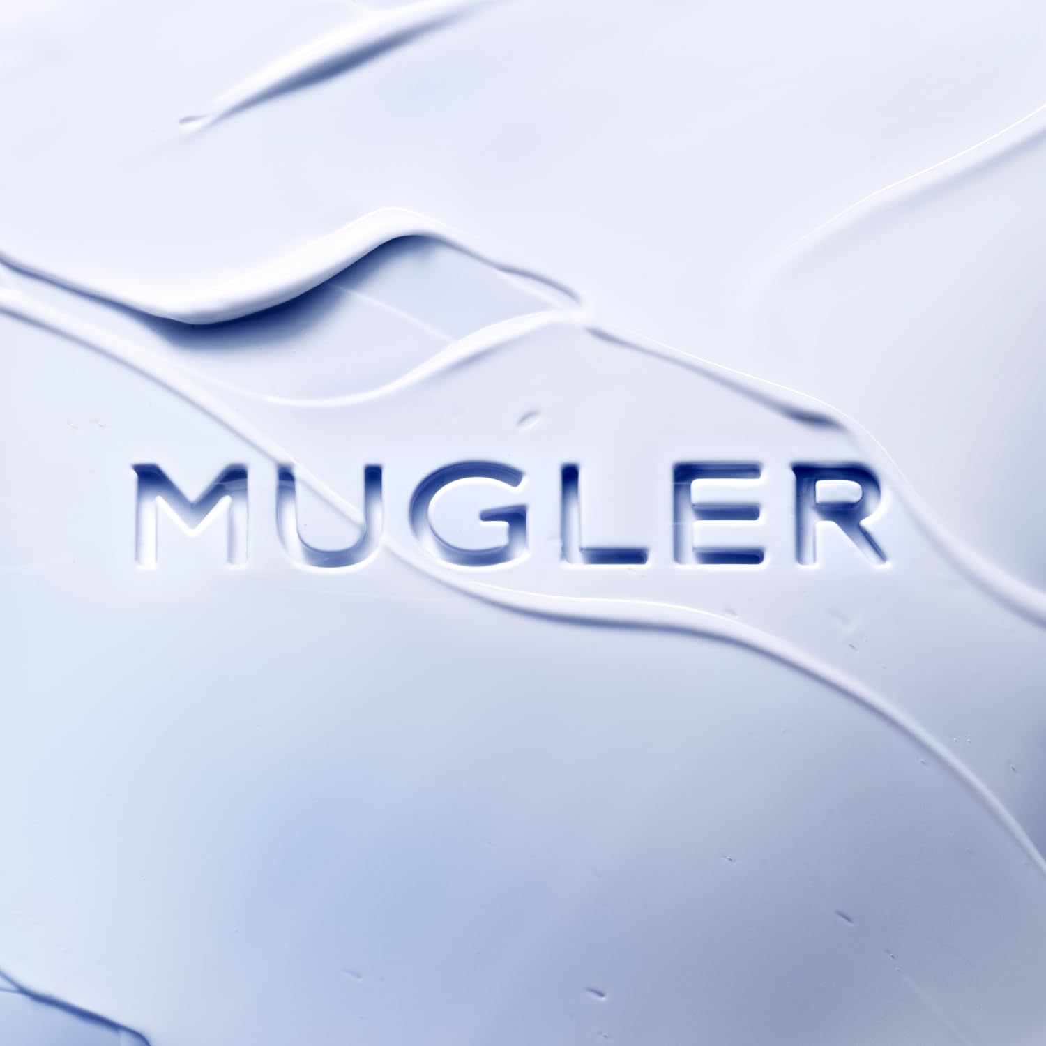 Mugler Angel body lotion creamy texture close-up suggesting rich hydration