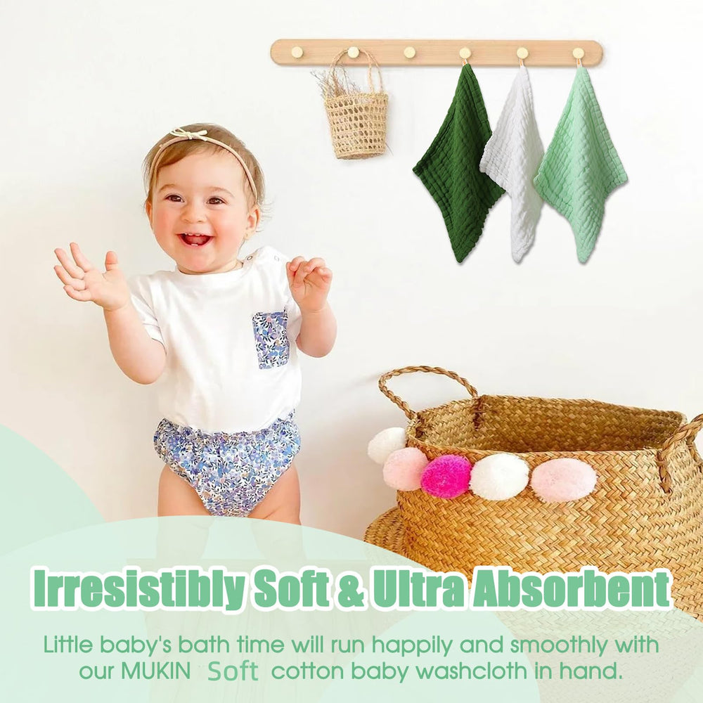 MUKIN baby-face wipe use shown for gentle newborn facial cleansing.