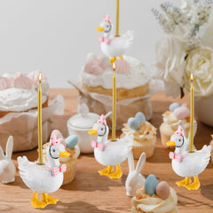 Mumufy goose candle holder with golden candle included for easy setup.