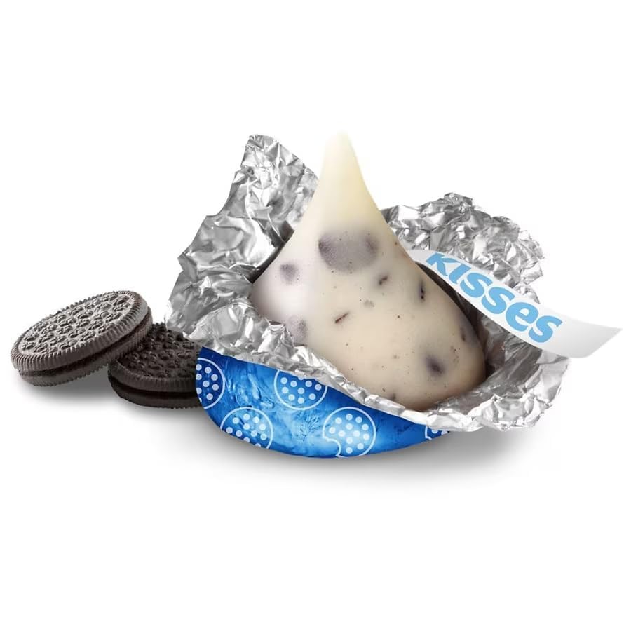 Munchique Cookies & Cream Kisses creamy center with cookie bits for rich flavor.