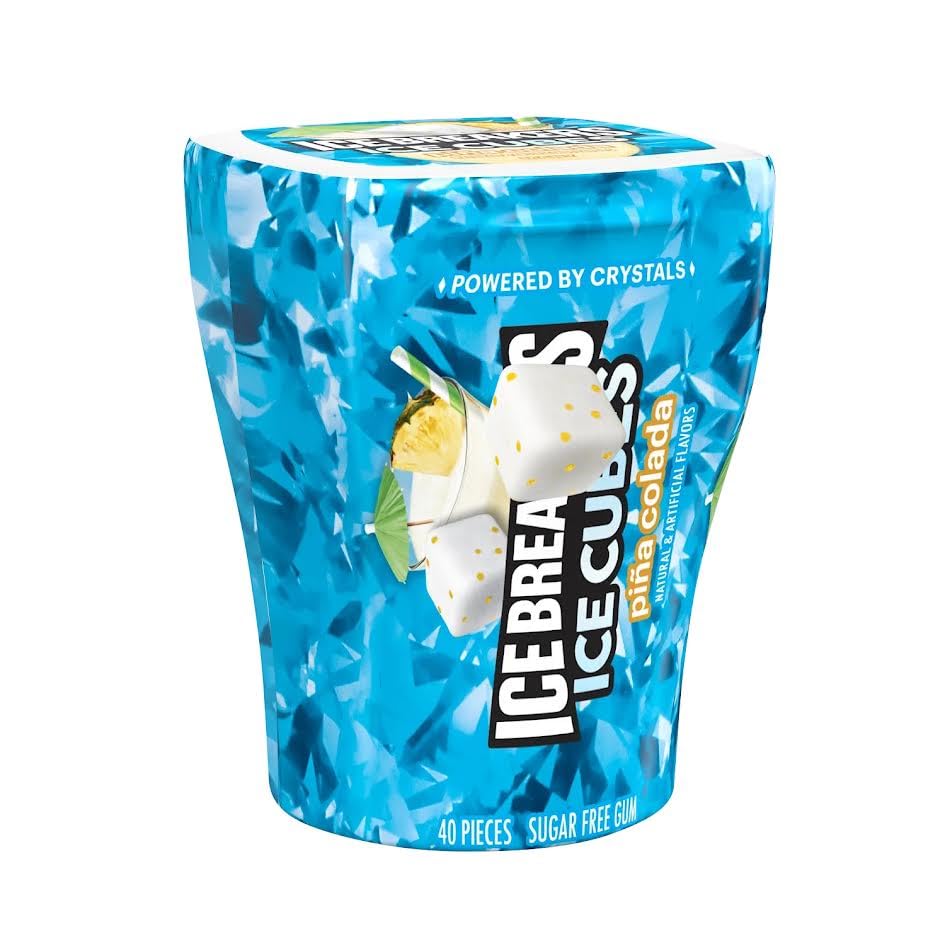 Munchique Cubes Chewing Gum Pina Colada on desk, easy tropical pick-me-up.