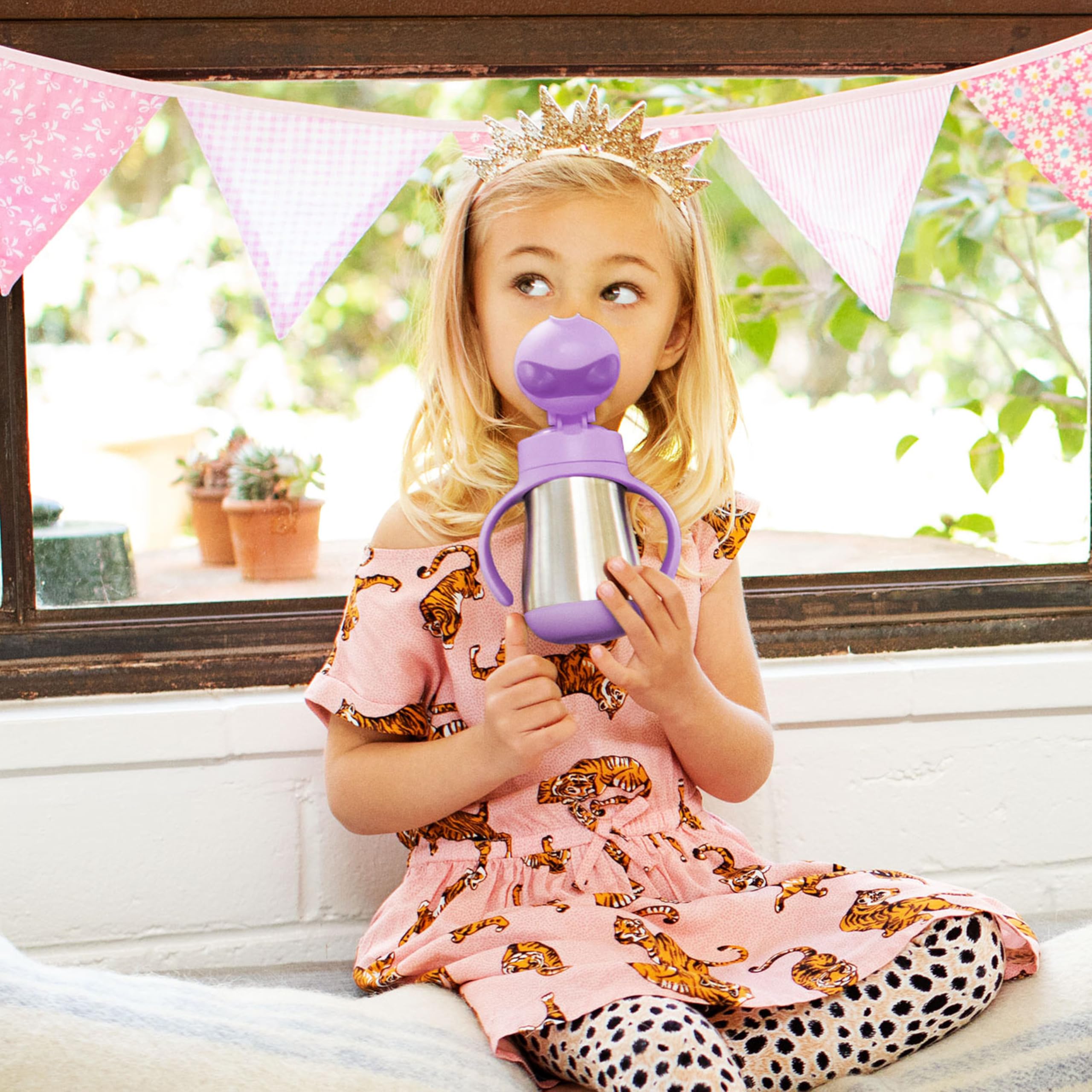 Munchkin flip-top lid, easy-open design for quick sipping on busy mornings