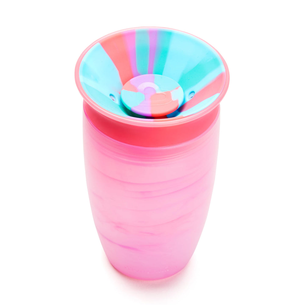 Munchkin Miracle 360 Tropical Swirl cup lets toddlers sip from any side.