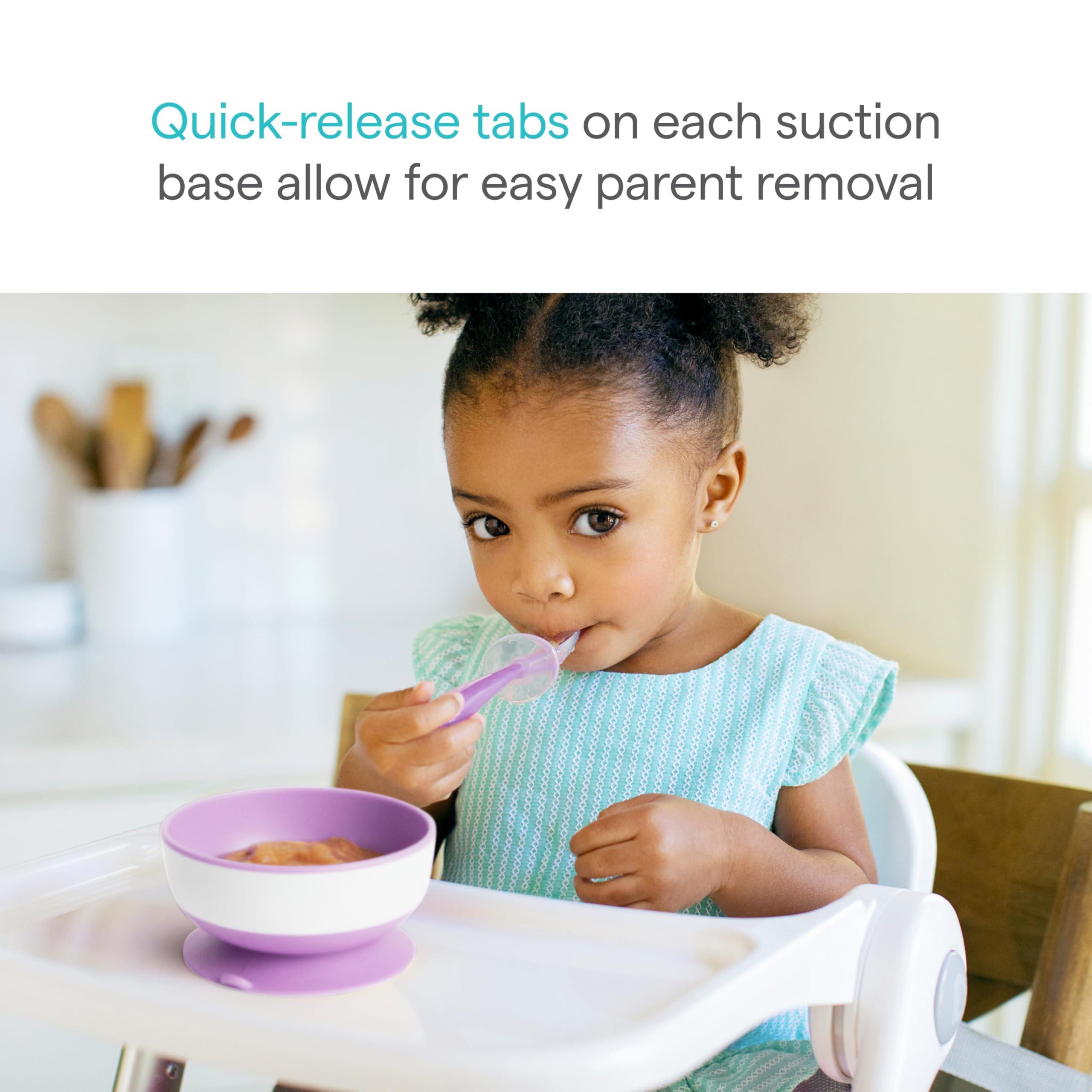Munchkin Stay Put suction base grips a table during feeding