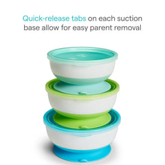 Munchkin Stay Put bowls with lids ready for storage and leftovers.