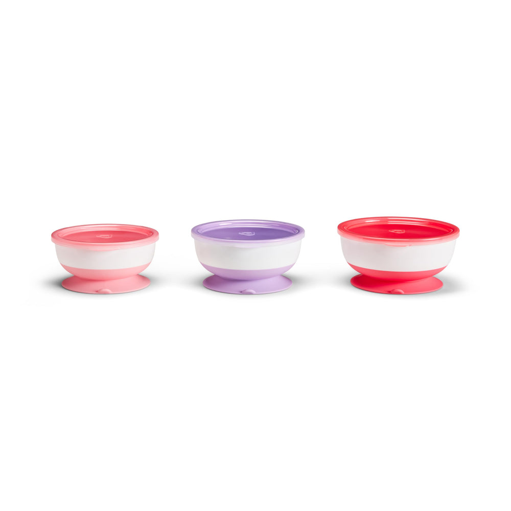 Munchkin Stay Put suction bowls in pink and purple stay in place for mess-free meals