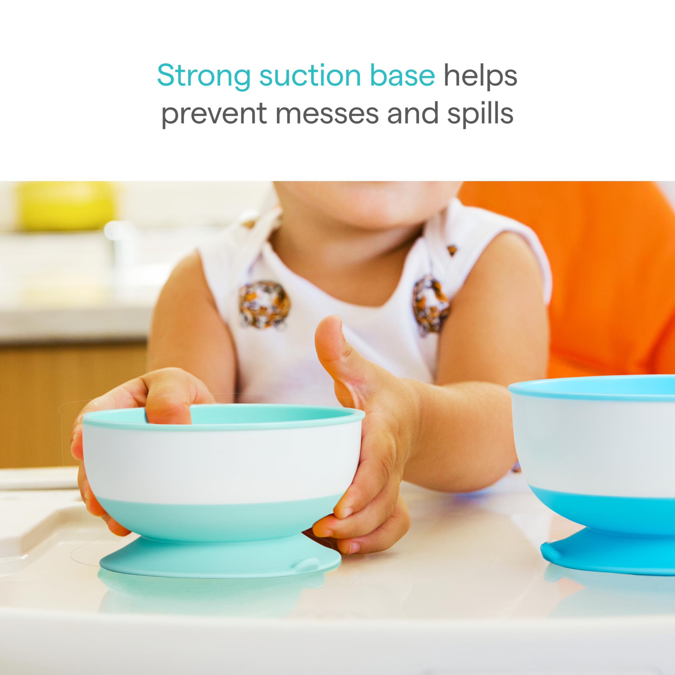 Munchkin Stay Put suction base gripping a high chair for mess-free meals.