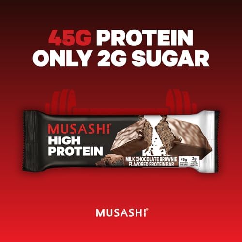 A hand holding a Musashi bar for convenient on-the-go nutrition