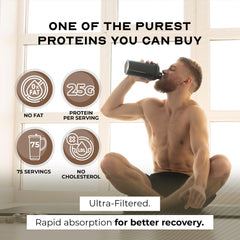 Muscle Feast whey protein isolate chocolate being poured for a smooth shake