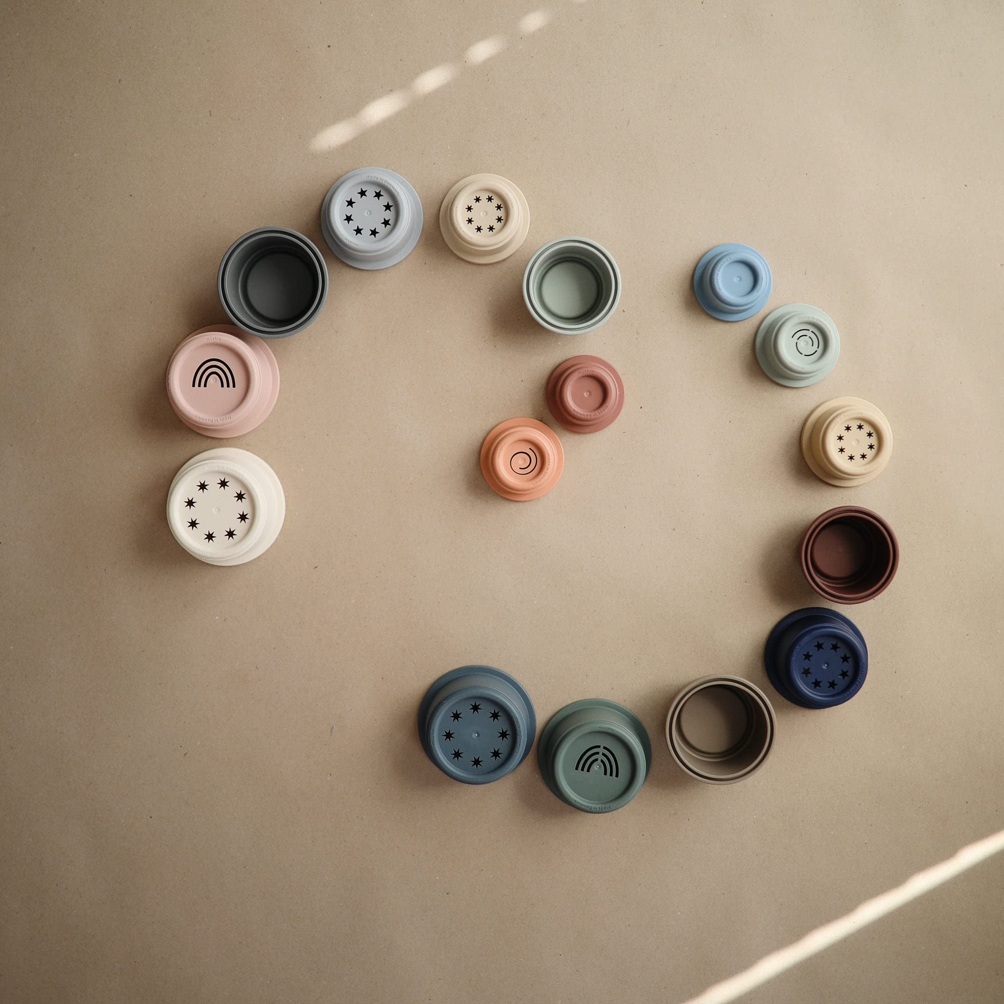 Mushie Danish Hygge design image evokes calm exploration and cozy baby play.