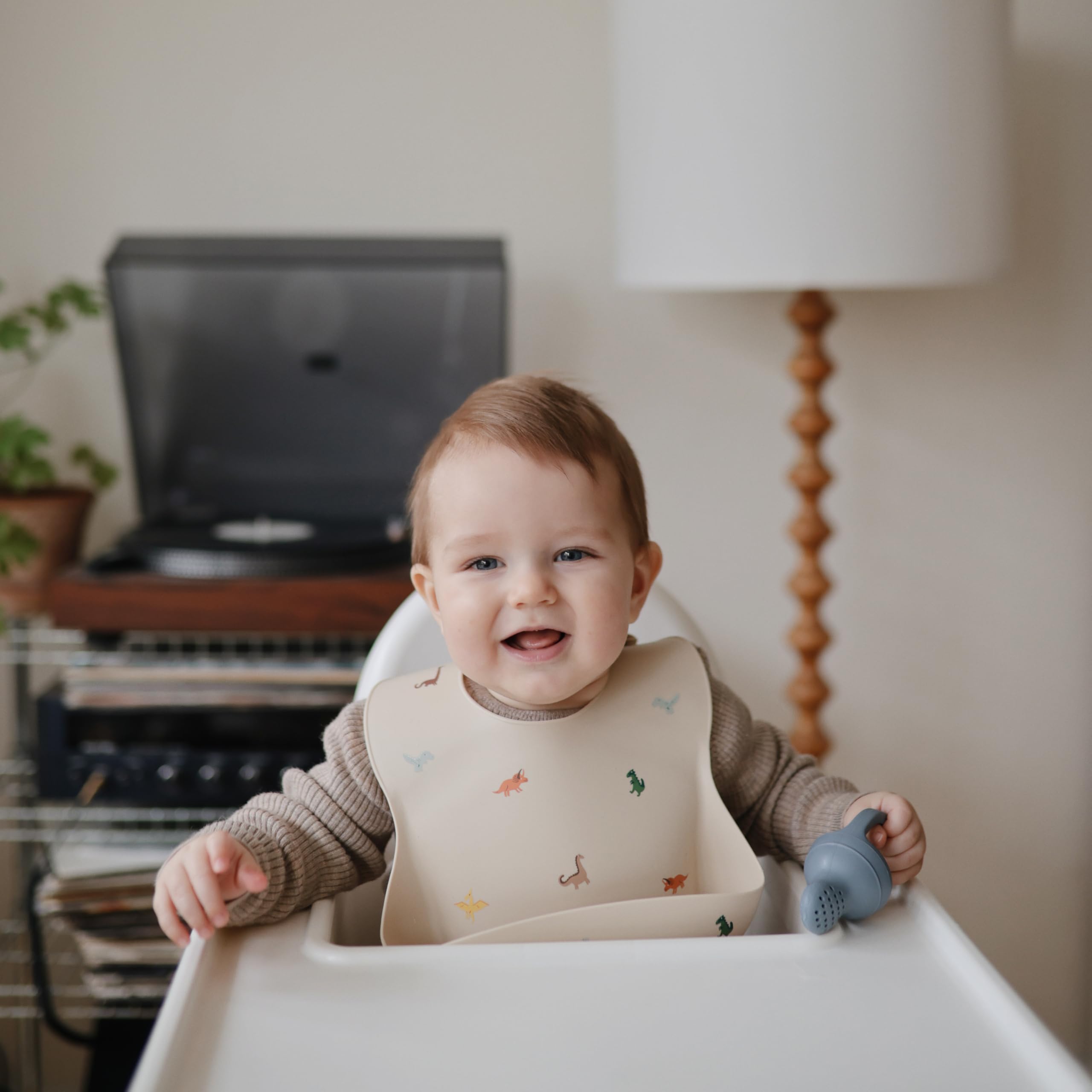 Mushie silicone bib made from food-grade material, free of harmful chemicals.