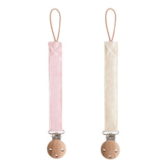 Mushie linen pacifier clip blush close-up, secure hold for on-the-go soothing
