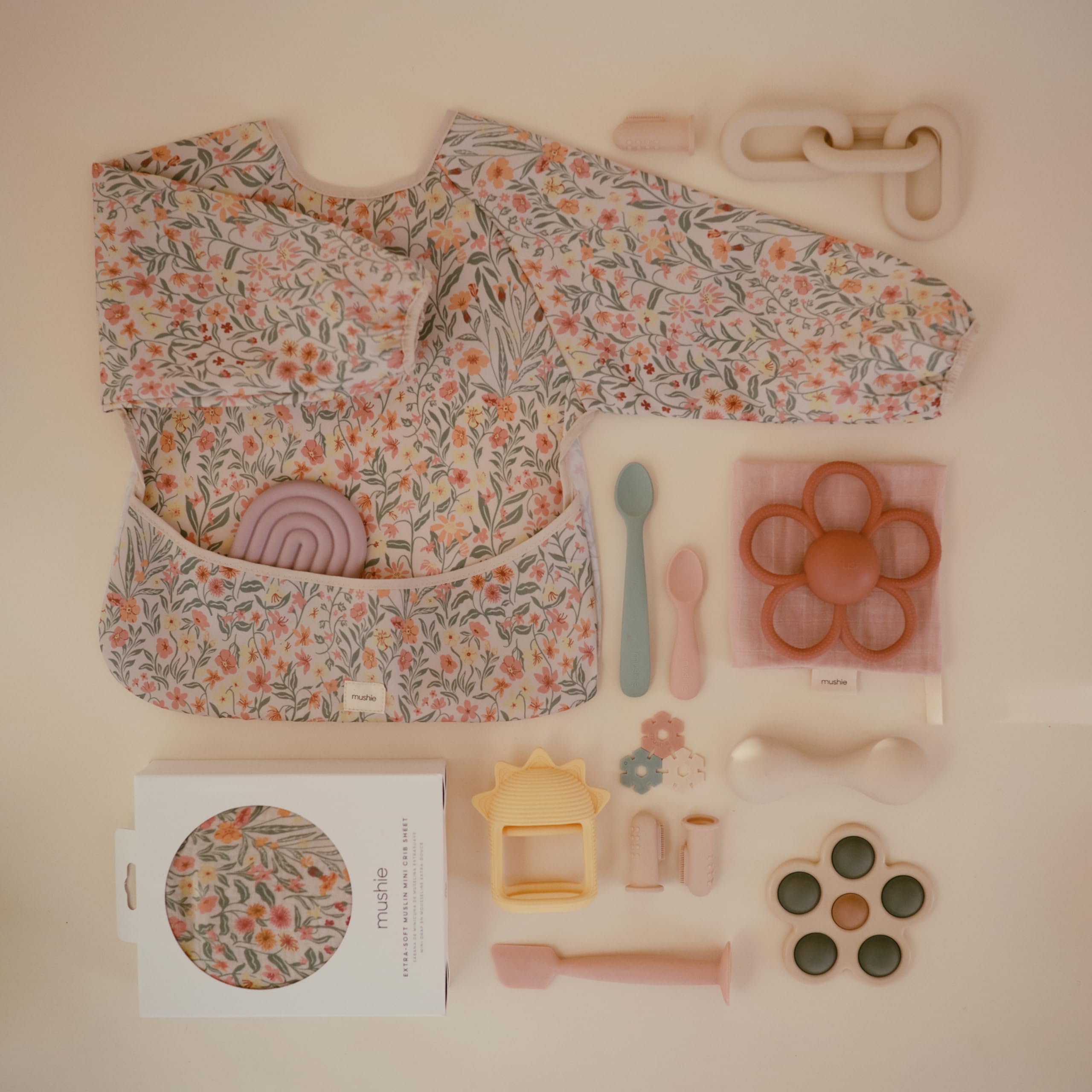 Mushie bib is machine washable for quick cleaning after messy moments.