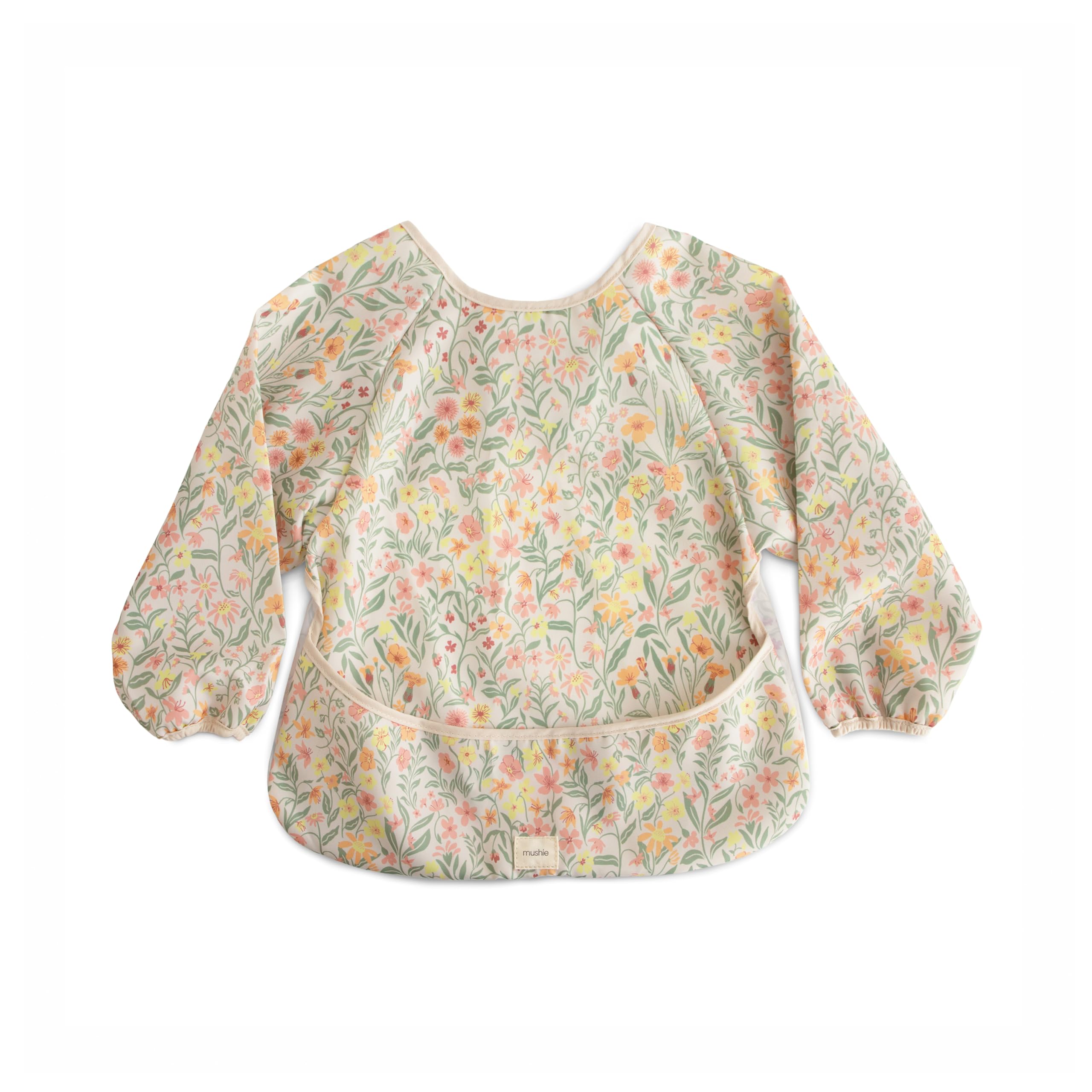 Mushie long sleeve bib pastel blooms close-up highlights spill-catching design for mealtimes.